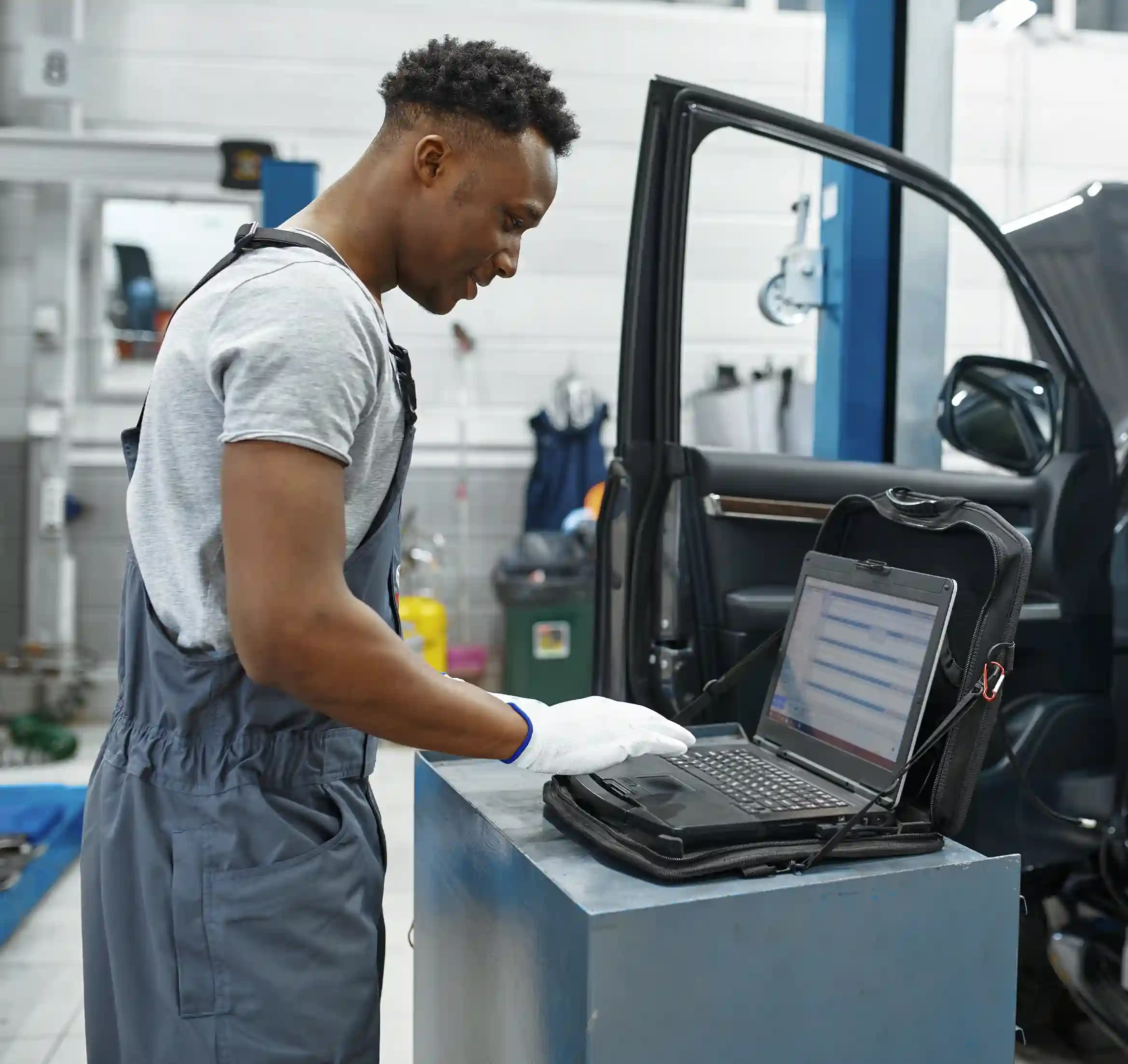 ADAS technician using diagnostic tools on vehicle in Broadmeadows workshop for precise calibration
