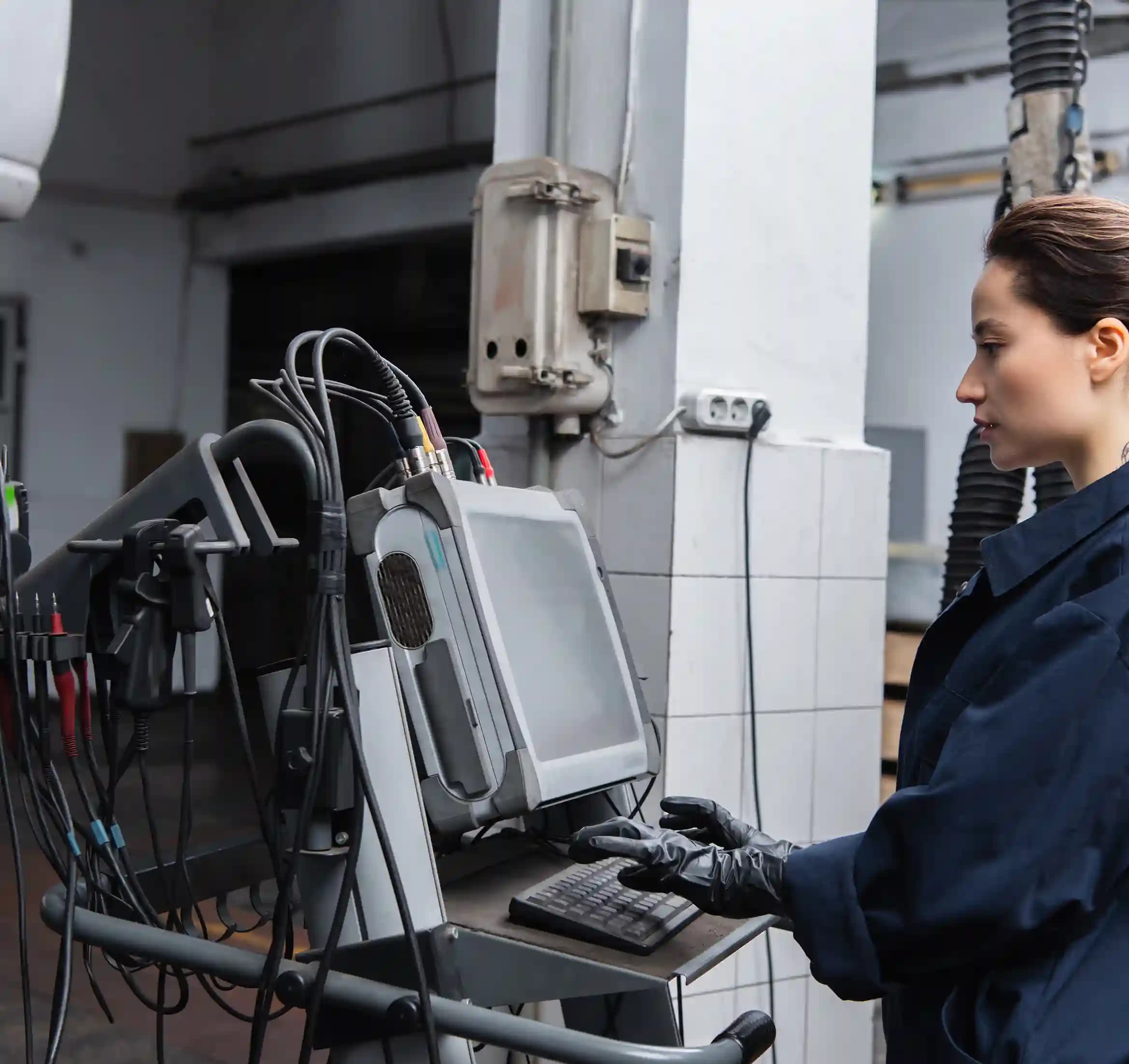 ADAS technician using diagnostic tools on vehicle in Craigieburn workshop for precise calibration