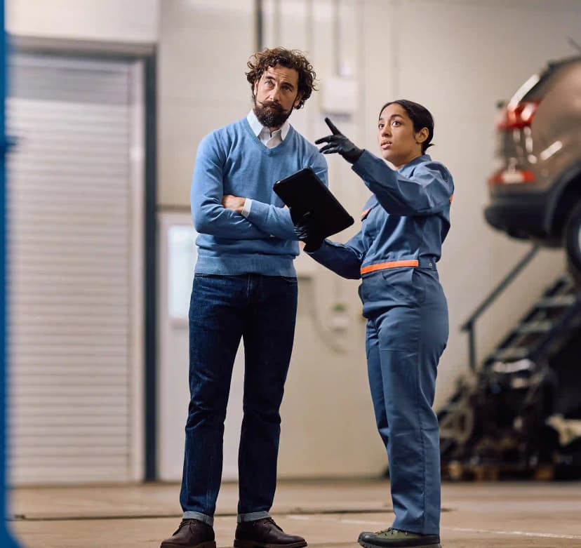 Technician performing ADAS camera calibration on vehicle windscreen in Greenvale Melbourne workshop