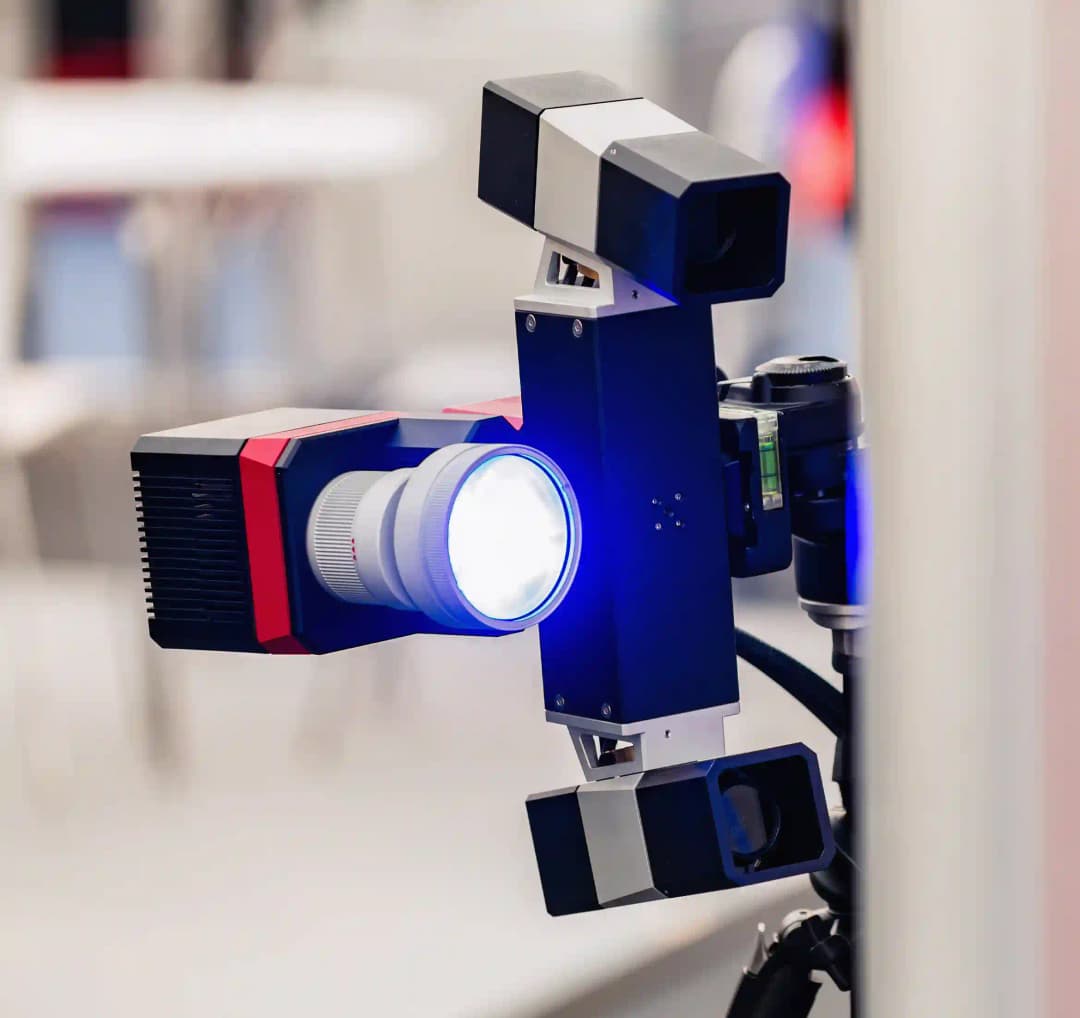 ADAS technician using diagnostic tools on vehicle in Melbourne Airport workshop for precise calibration